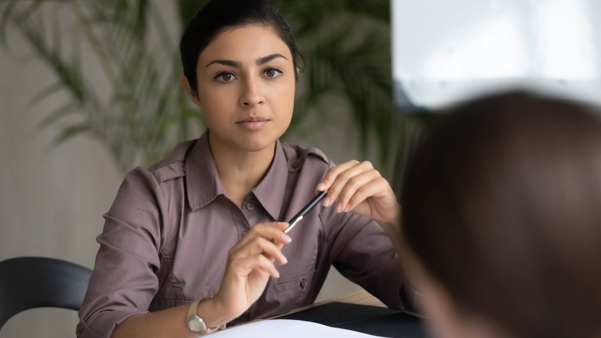 high iq woman reflecting before reacting