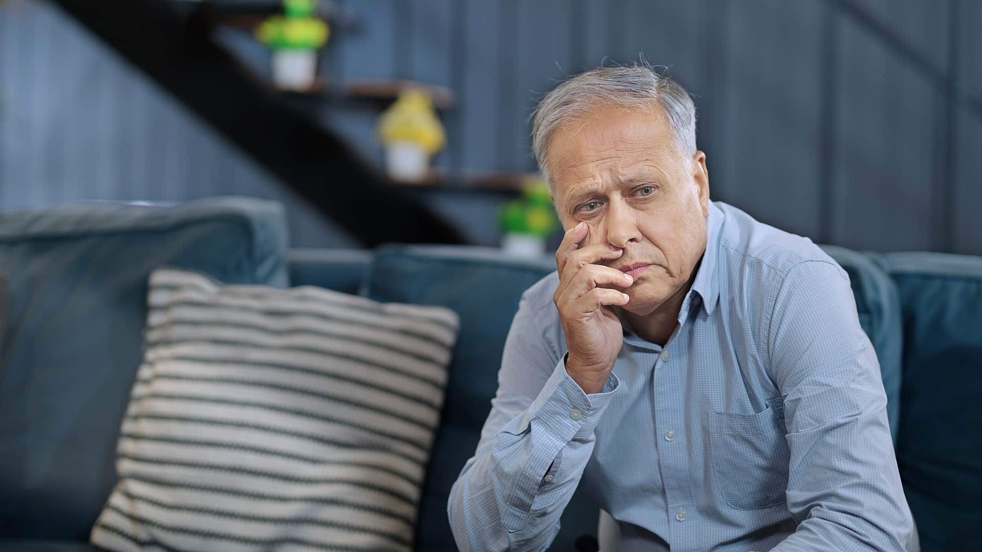 man sitting alone needing space