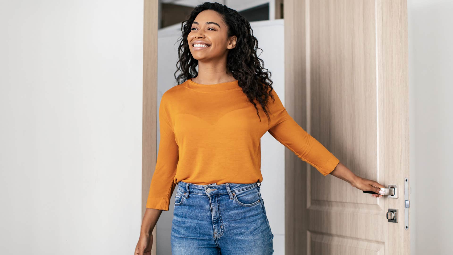 woman standing in a blocked entryway
