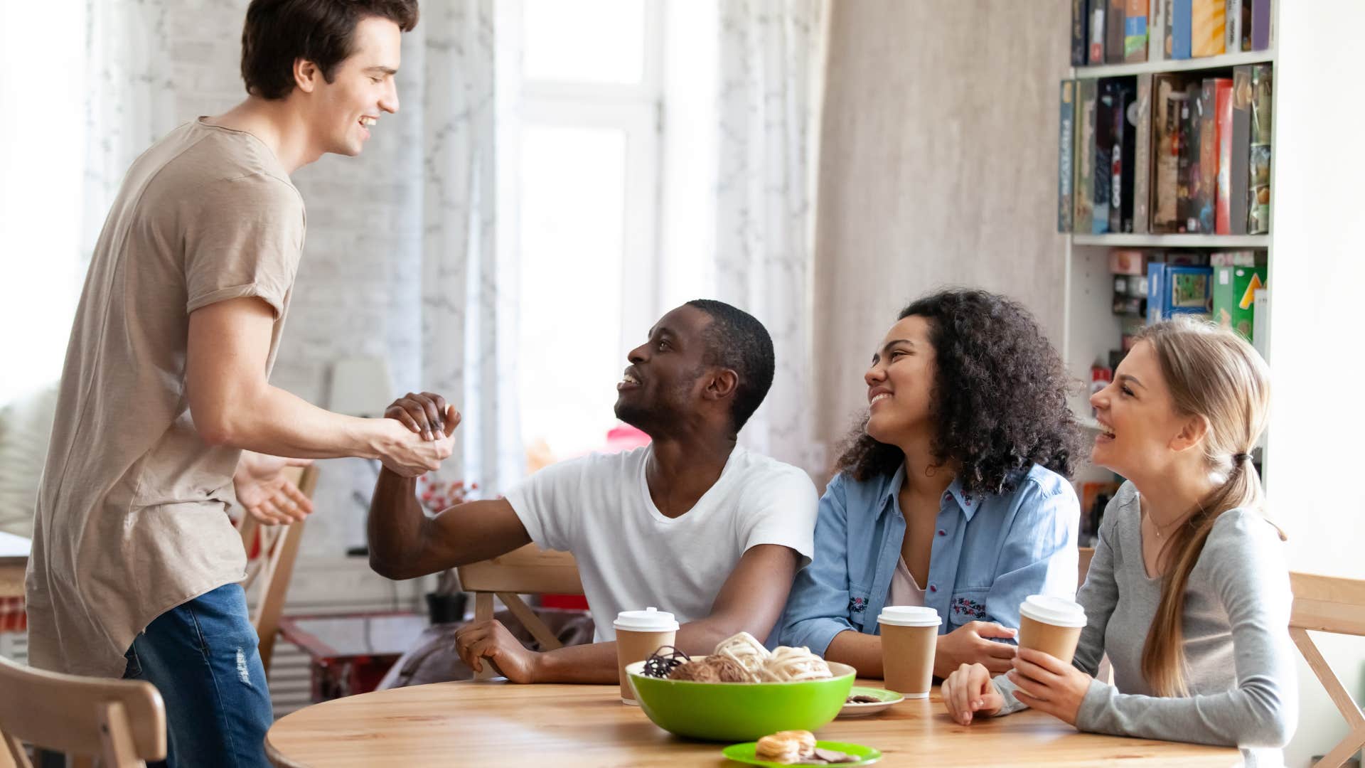 Group has comfortable conversation in home