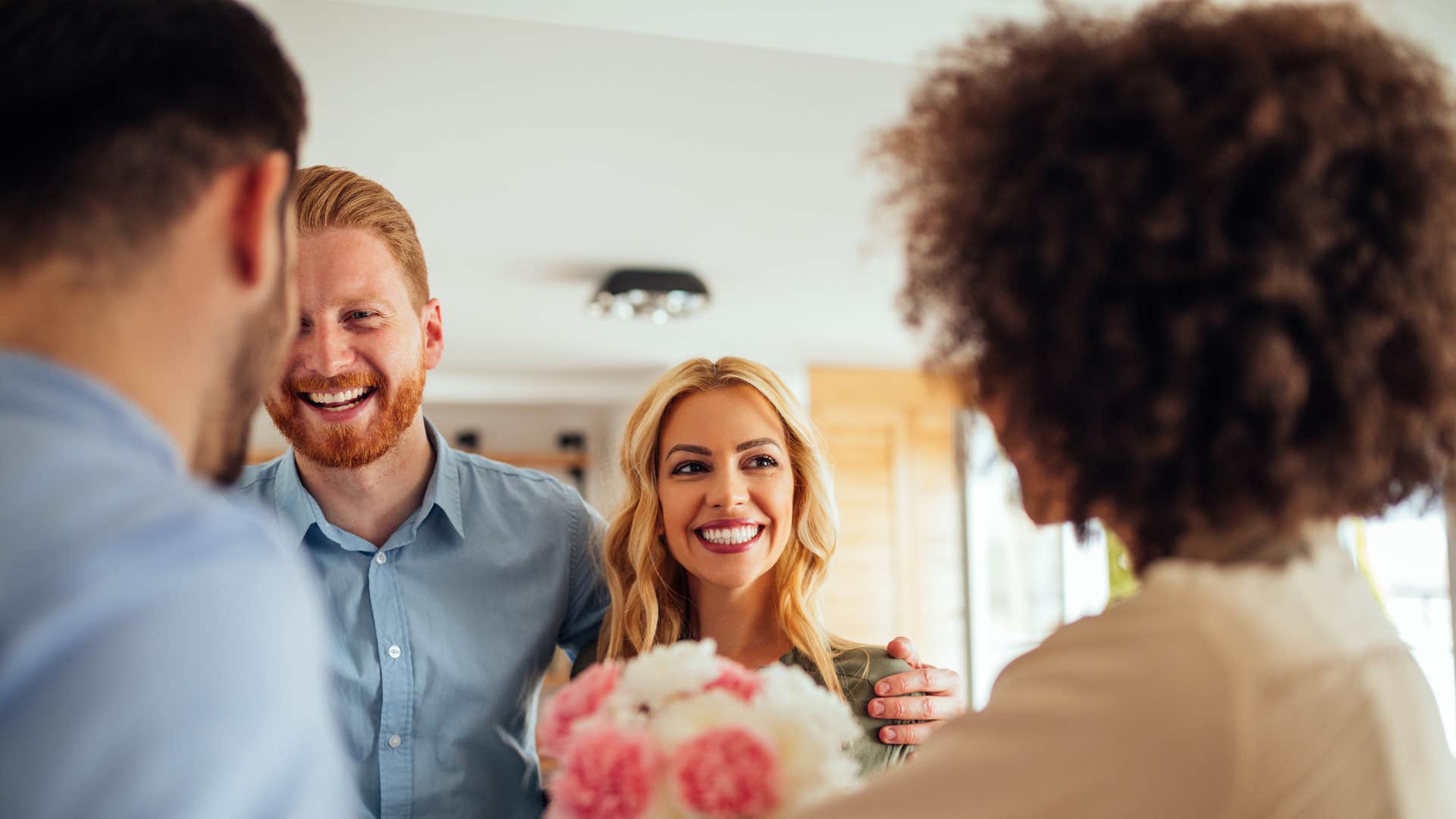 Couple makes people comfortable with greeting