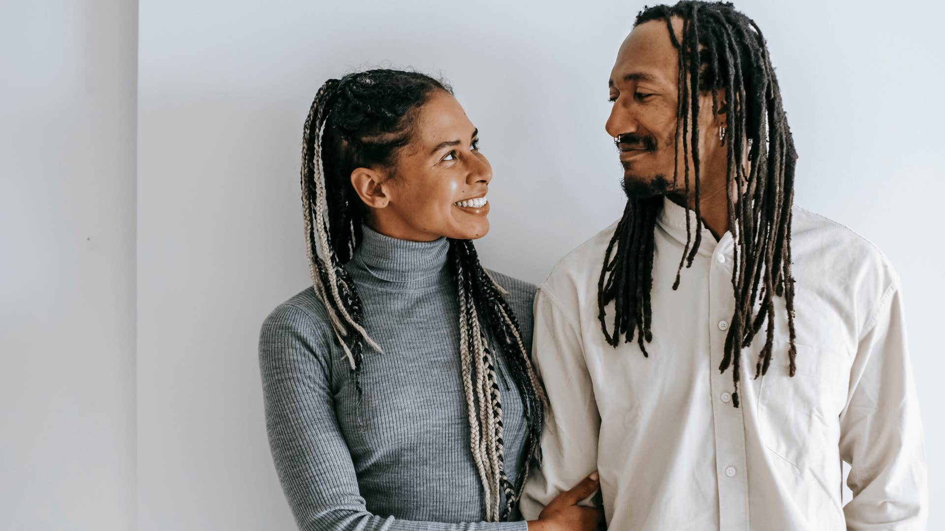 woman smiling demonstrating commitment to man