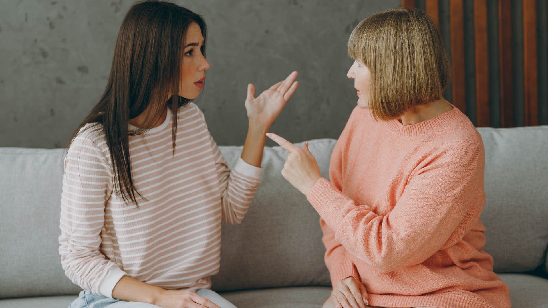 Woman saying "When are you getting married" to her upset adult daughter.