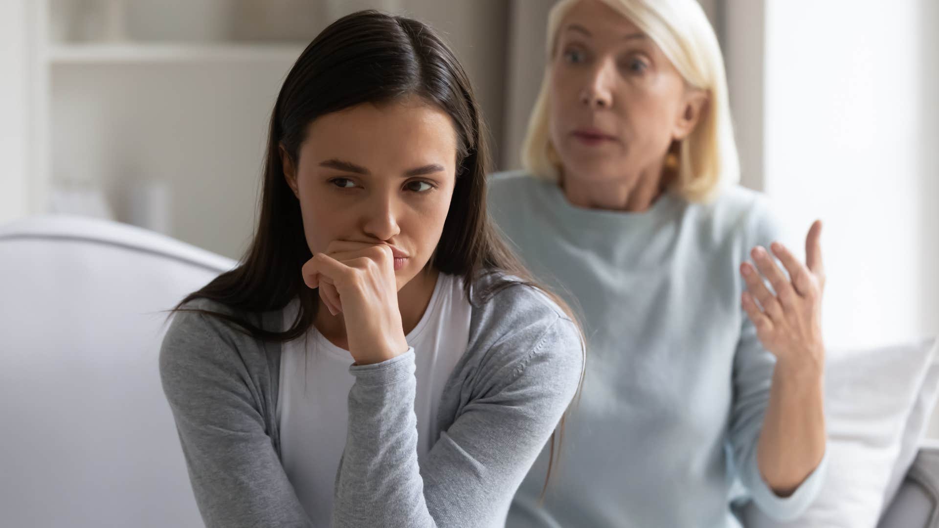 Upset woman saying "you're so immature" to her adult daughter.