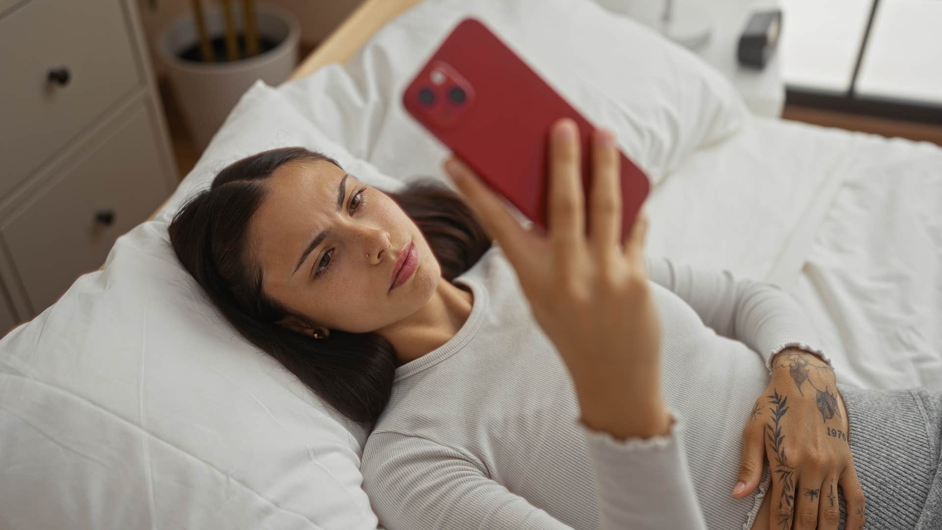 woman stalking other people's social media accounts