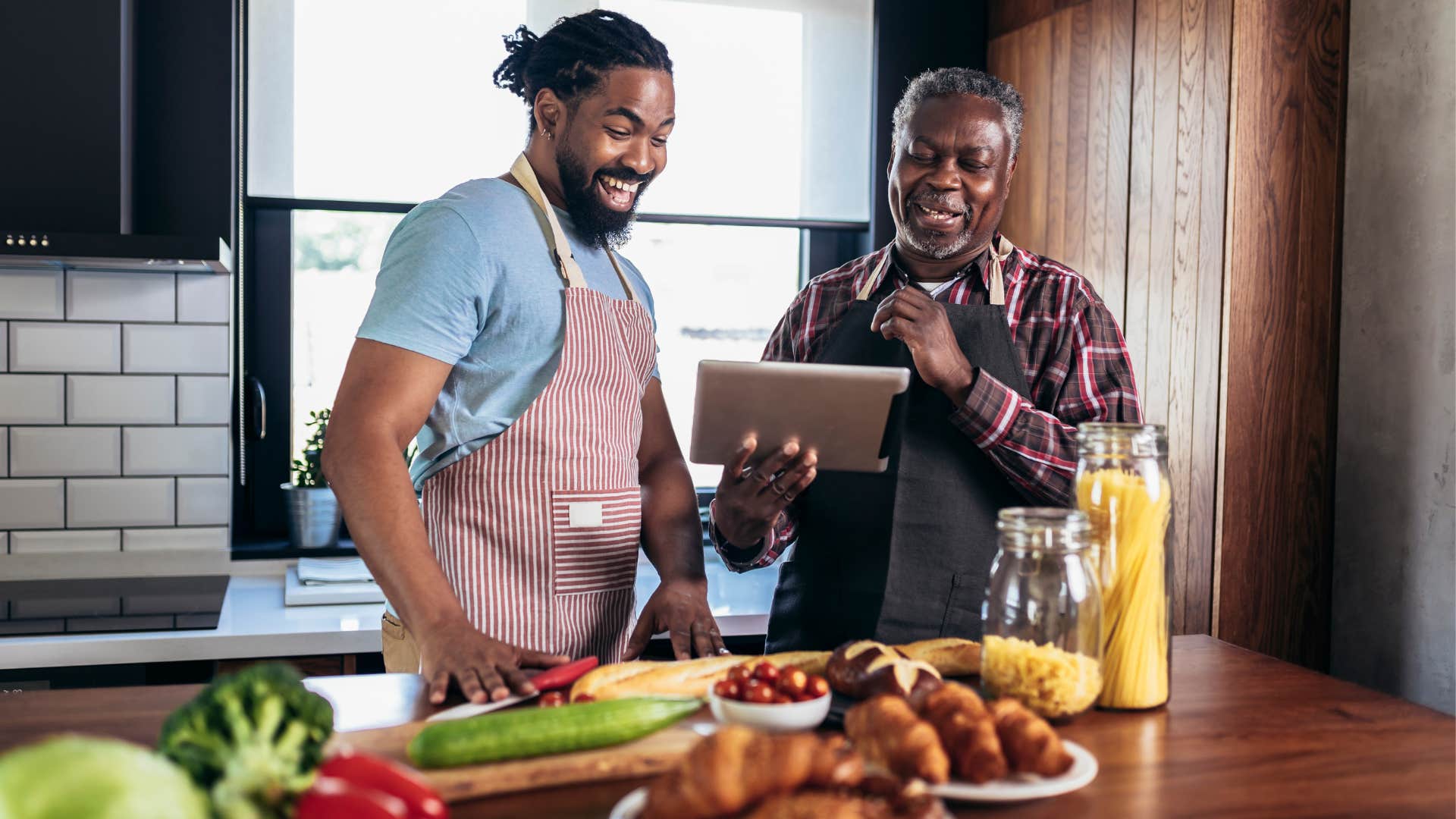 southern father and his son preparing supper