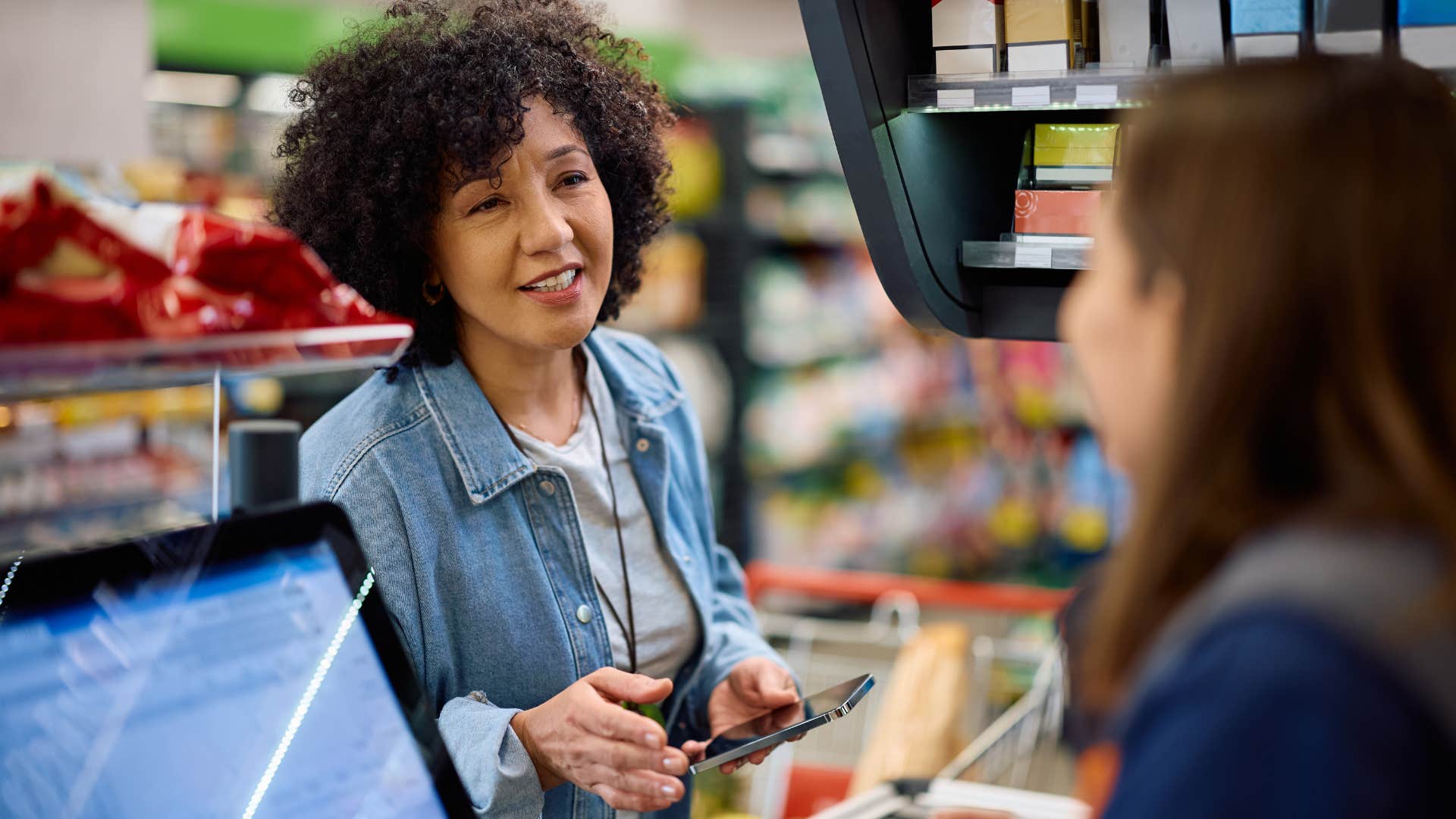 entitled woman being rude to cashier demanding she get special treatment