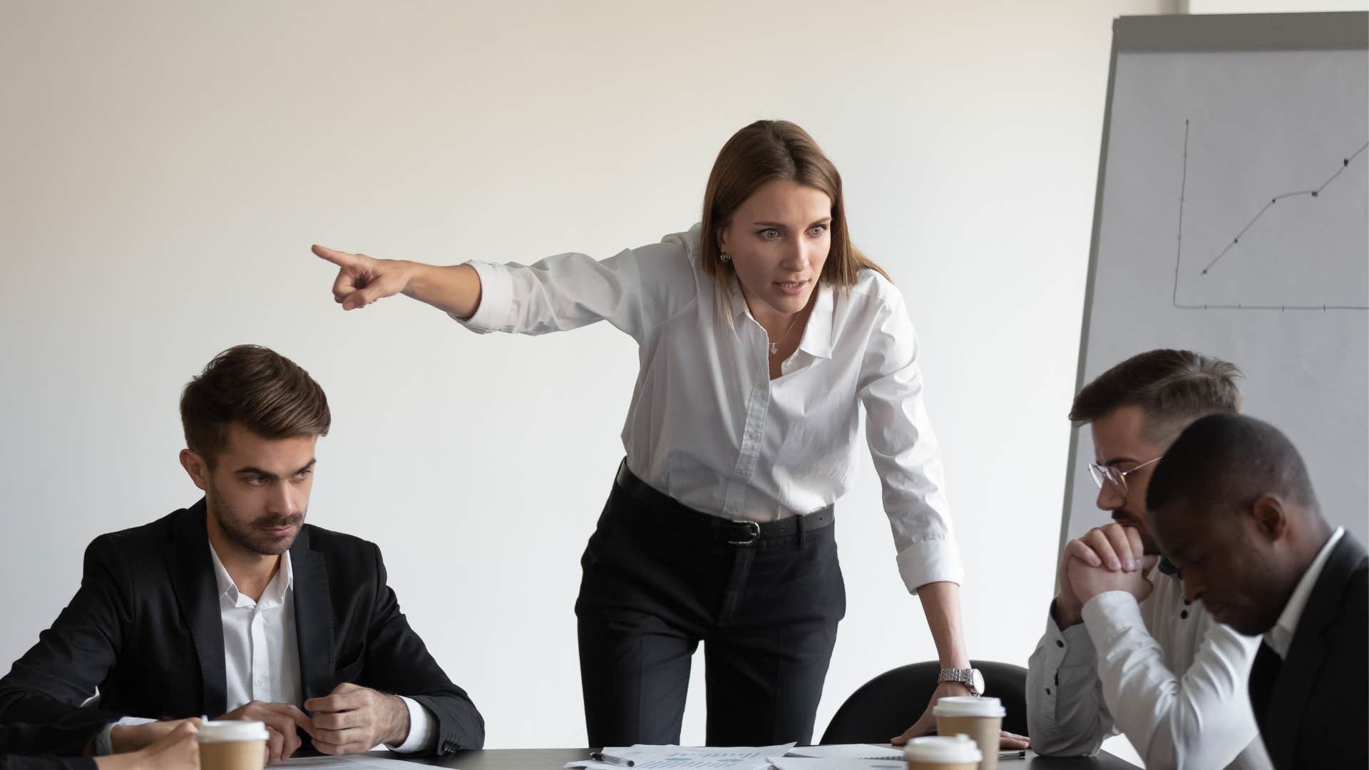 entitled woman yelling at a colleague saying its not my job