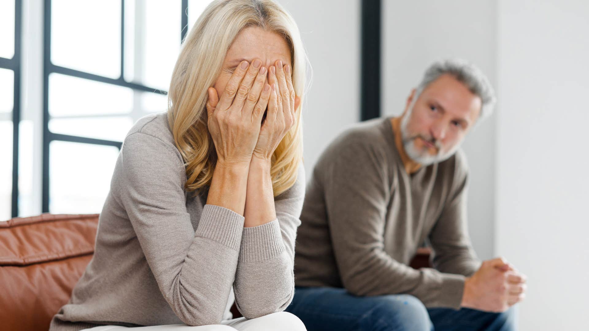Woman who seeks attention turned away from her husband.