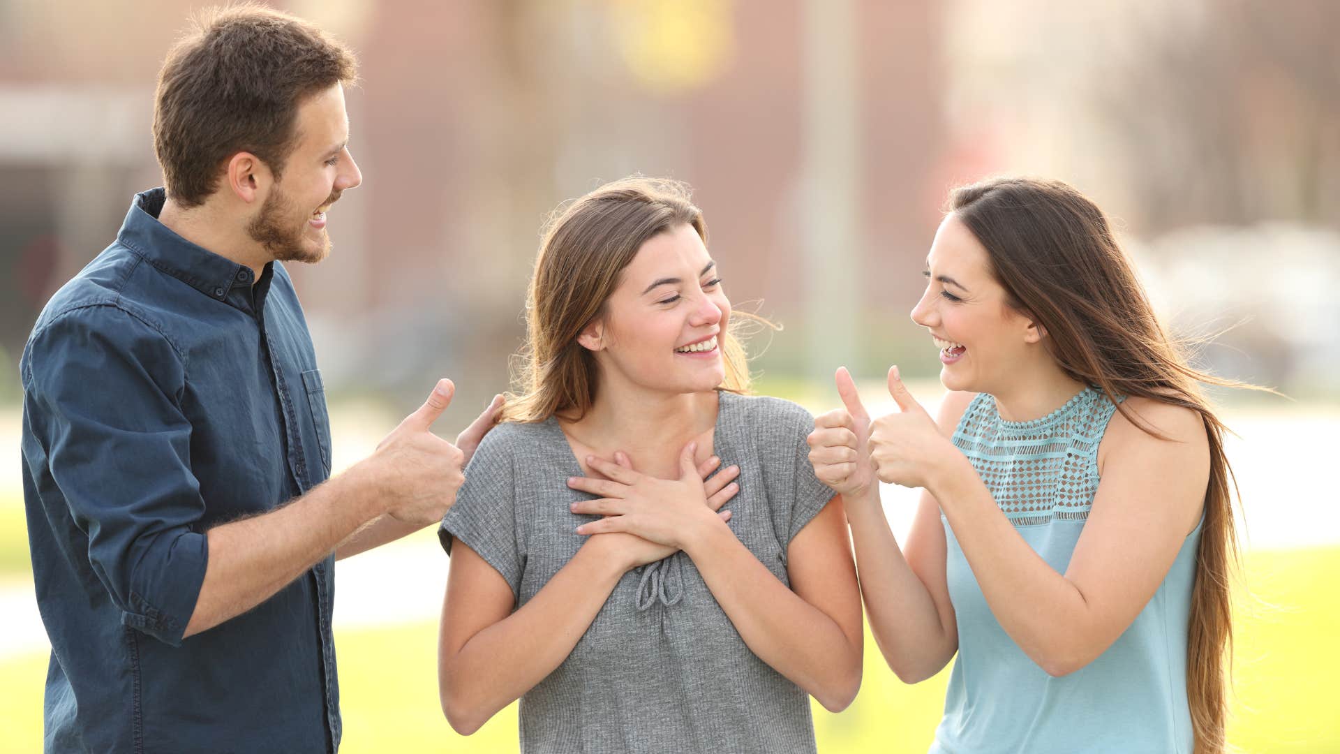 two friends being fake to friend in gray shirt and saying you look so healthy