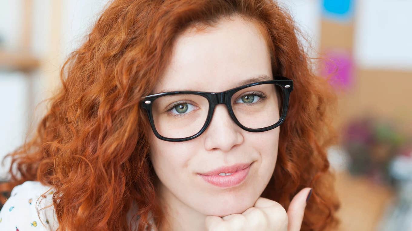 Things Standout Employees Do On A Regular Basis Woman who is a standout employee.