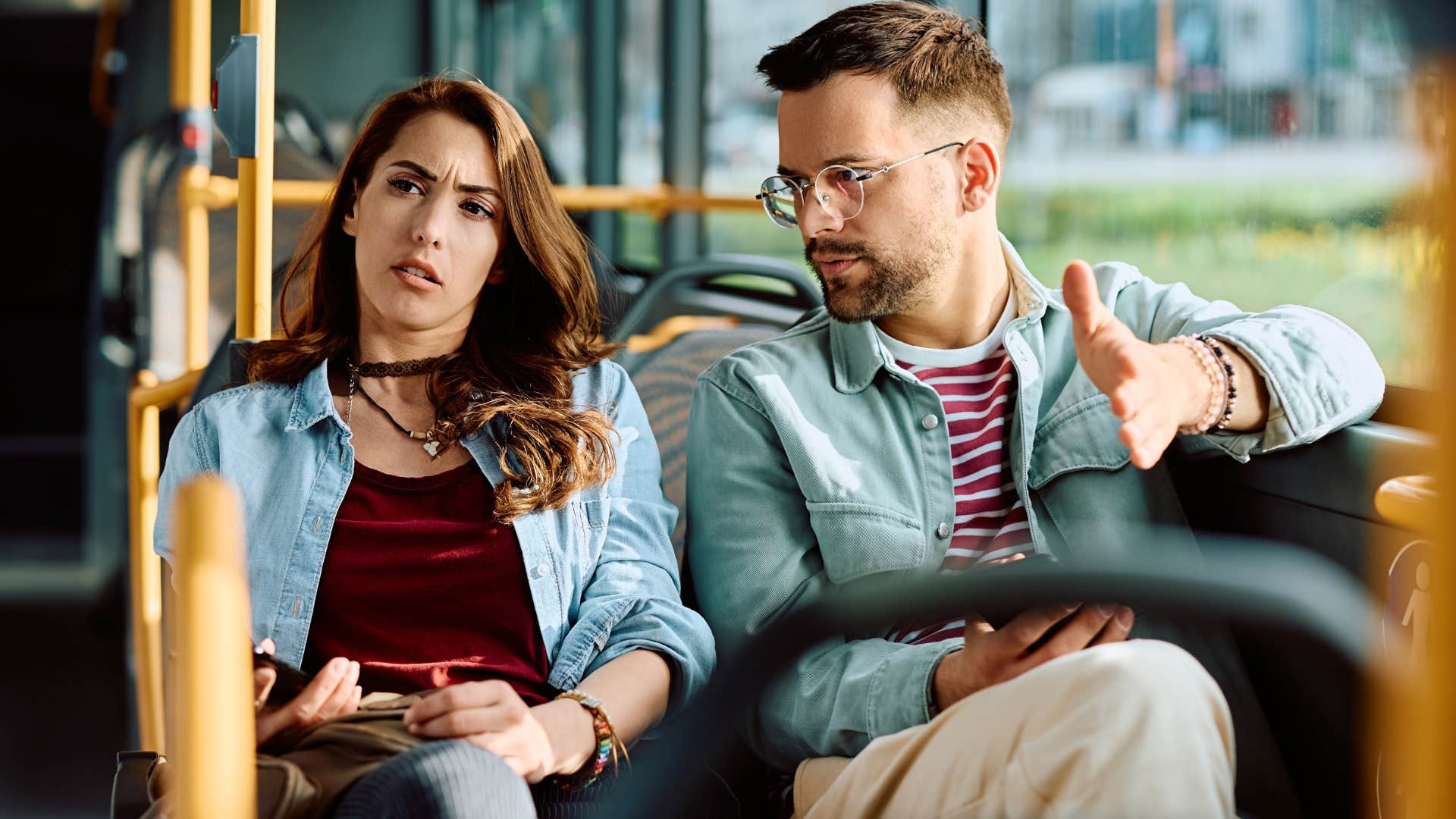 Woman causing a scene in public with her partner.
