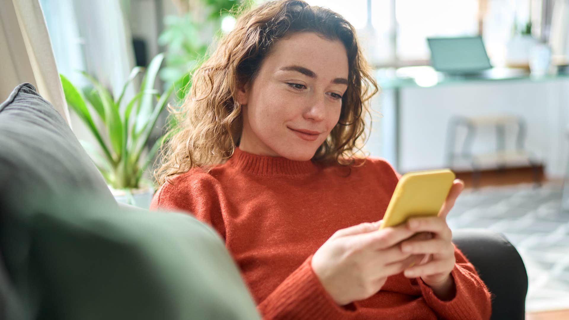 Woman posting their personal information on social media.