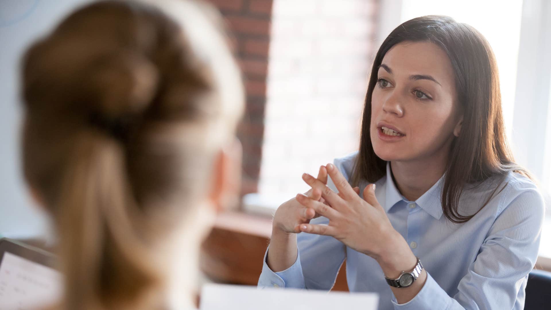 woman using performative intelligence to talk to boss