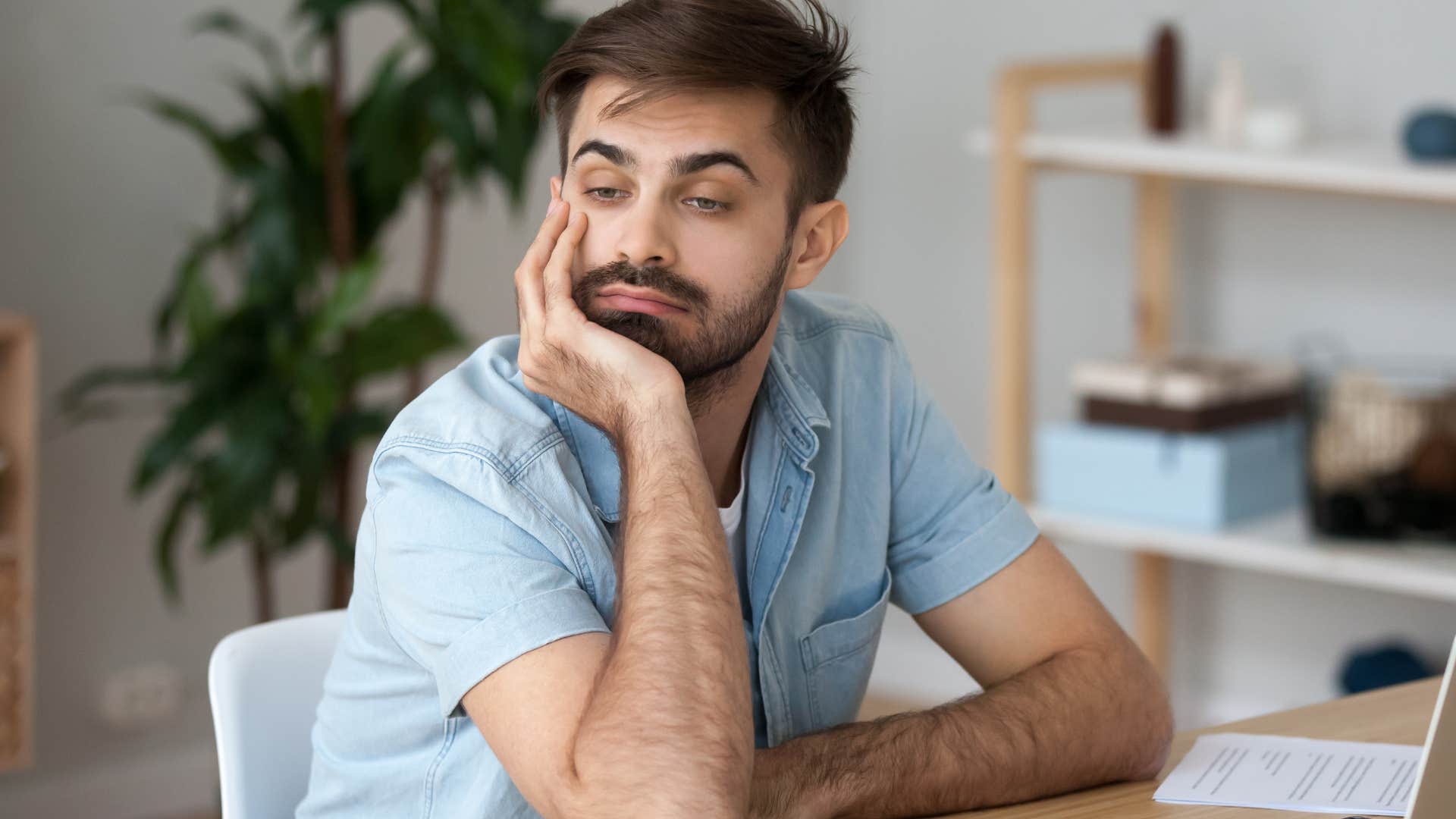 sad confused man lacking perspective looking away