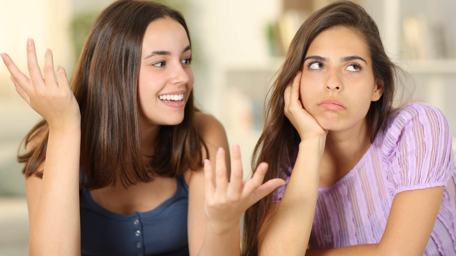 woman name-dropping to friend for attention