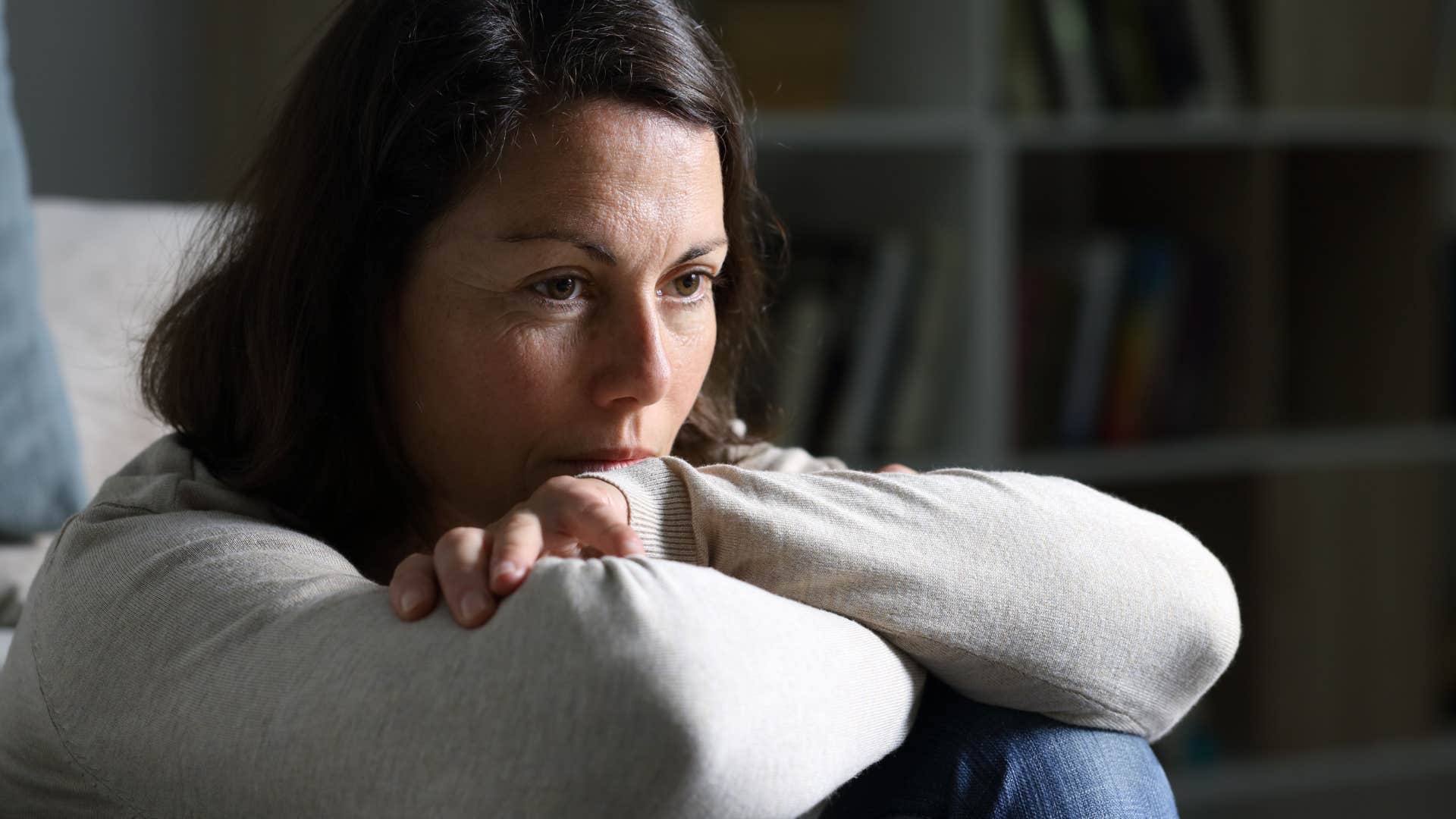 lonely woman looking stressed out by herself