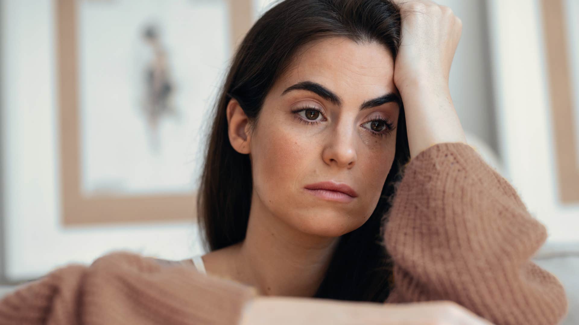 sad woman thinking about wasting time
