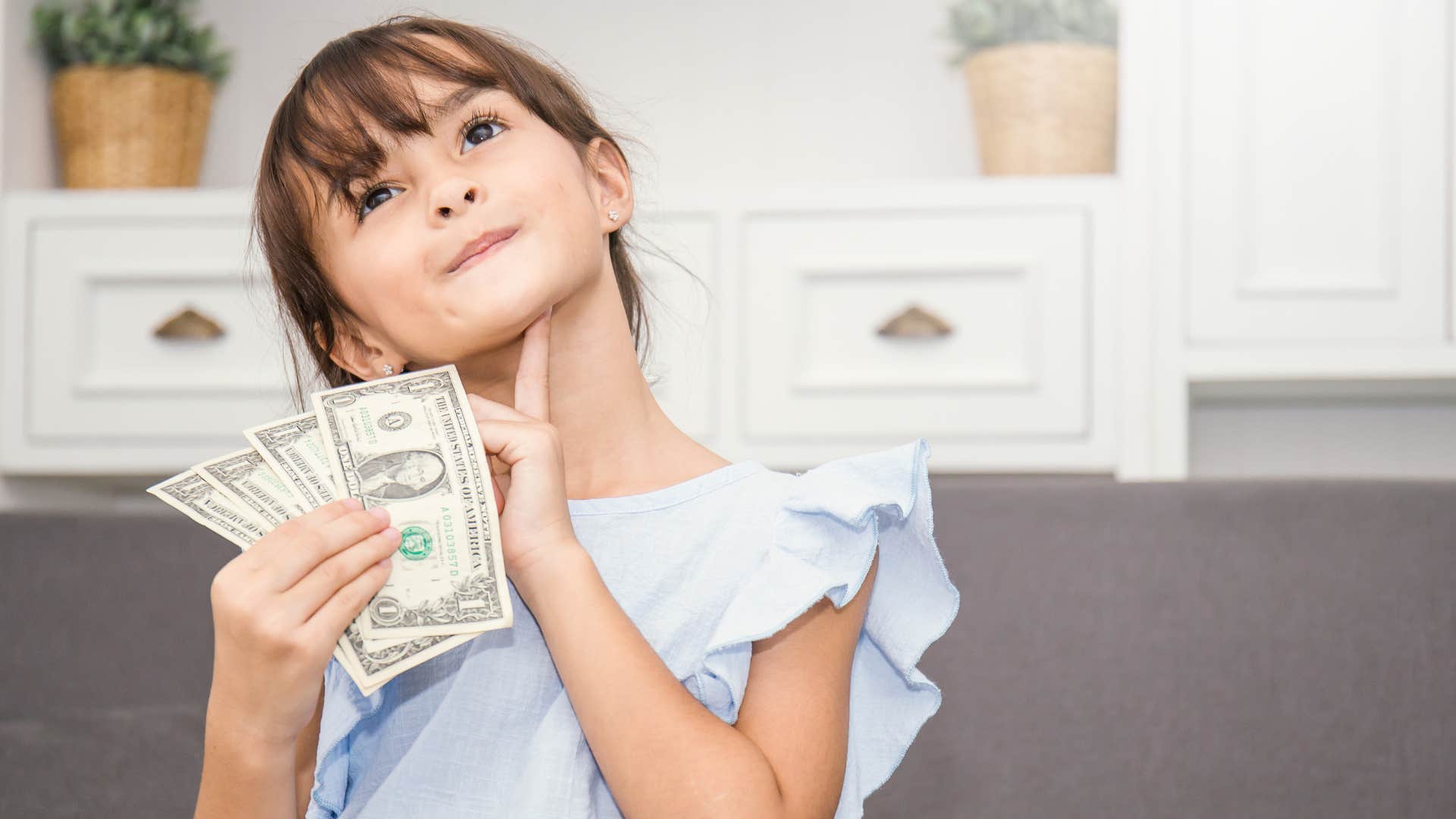 rich parents give their young daughter anything she wants including money