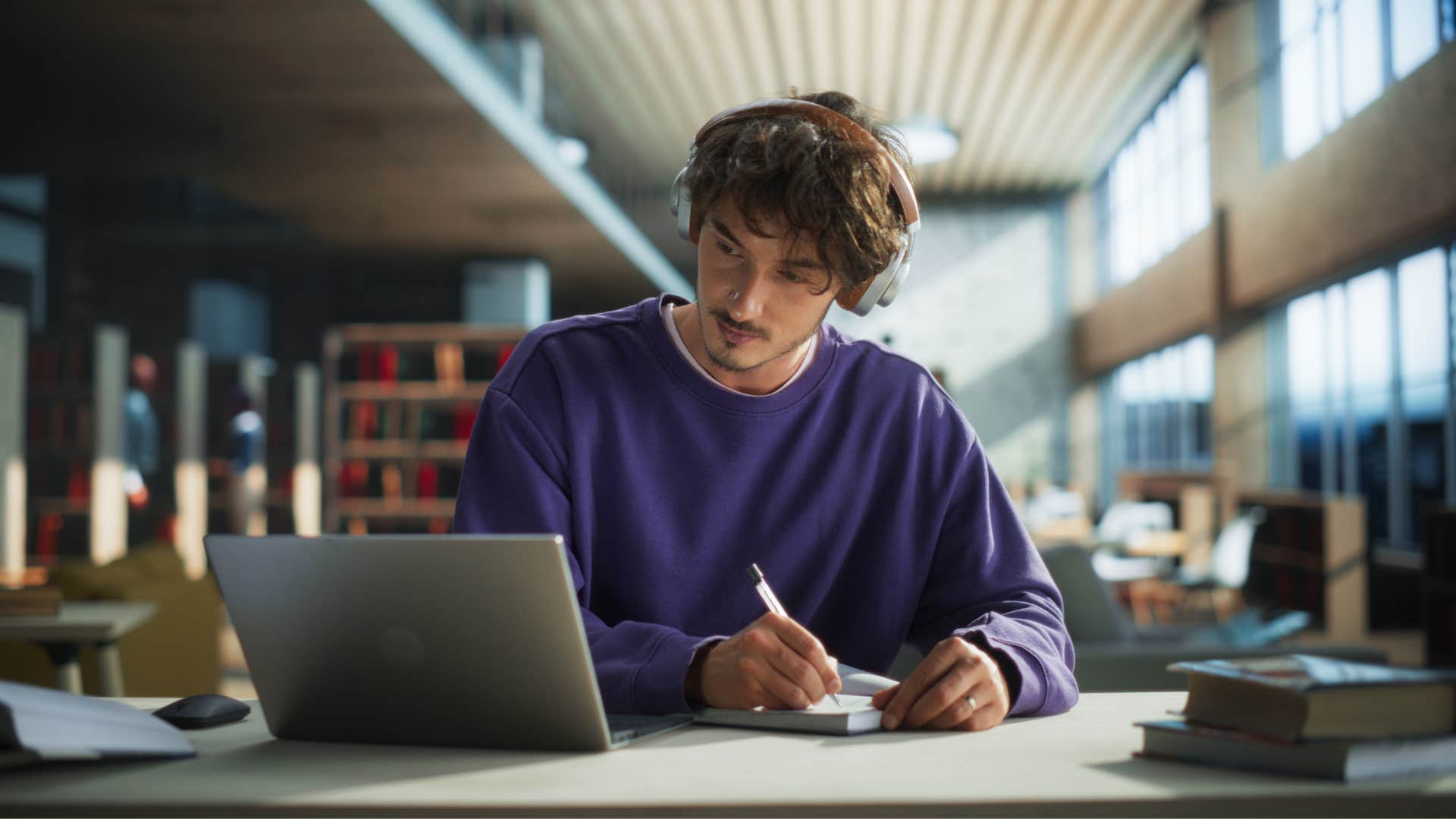 a young college student is isolated as he studies in library after everyone finds out his father donated to his school