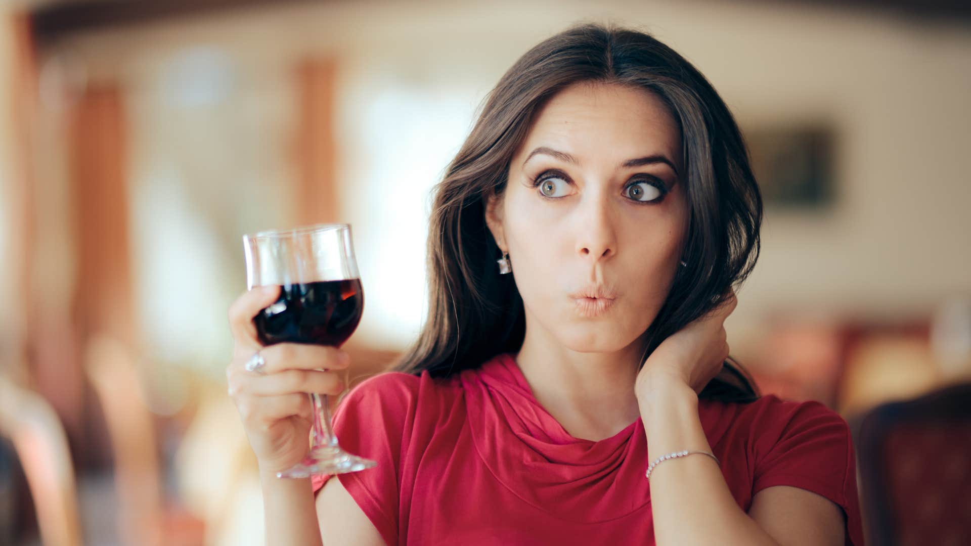 woman displaying her advanced knowledge of wine at a party