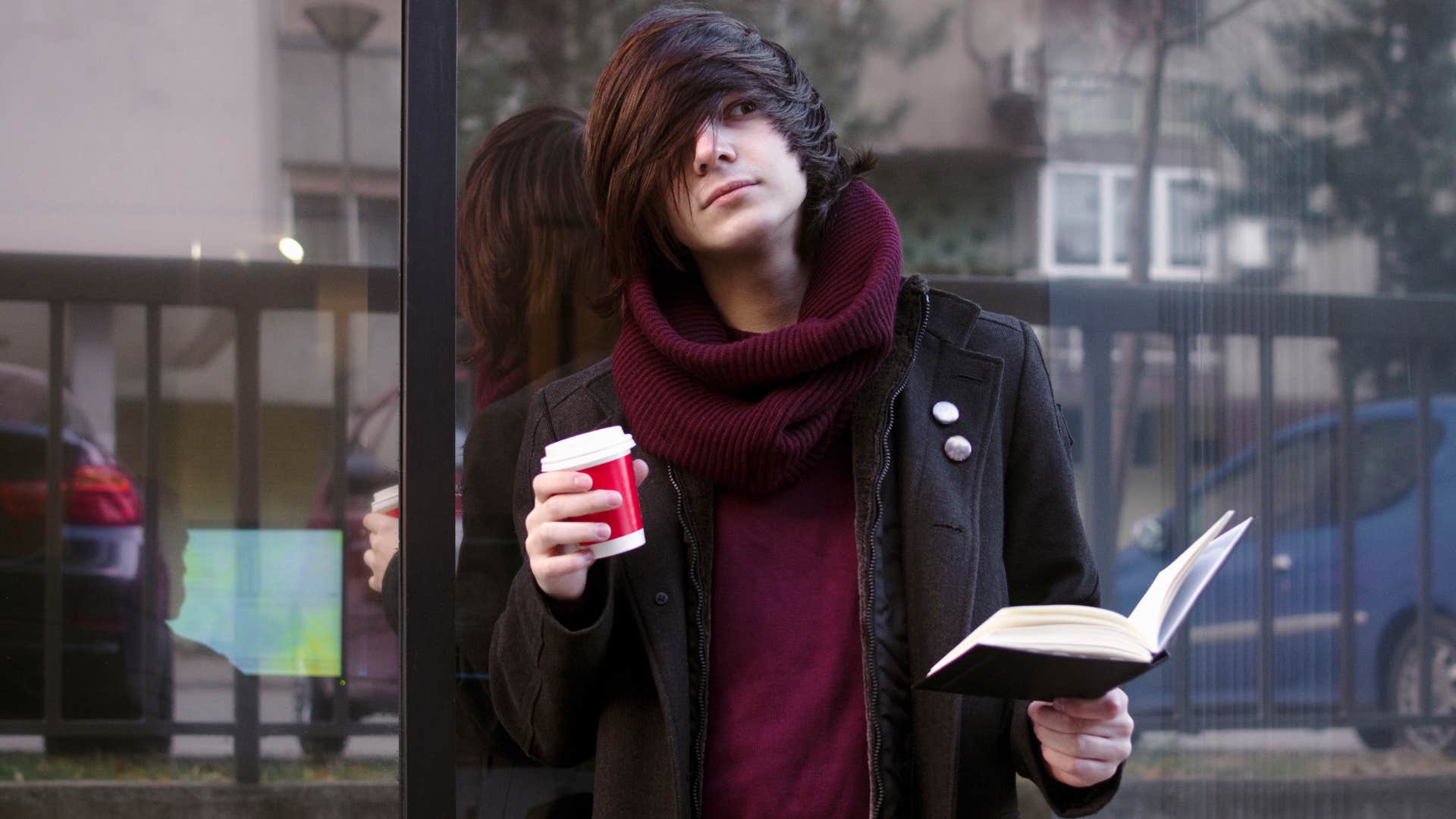 Teenager reads book