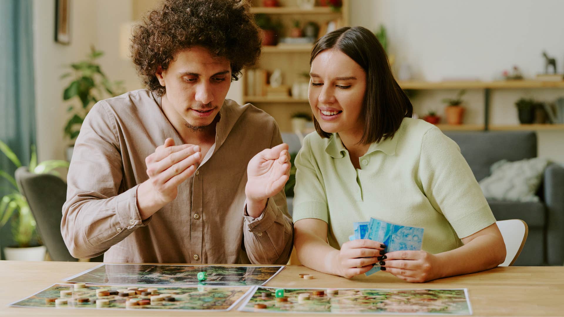 couple plays board game