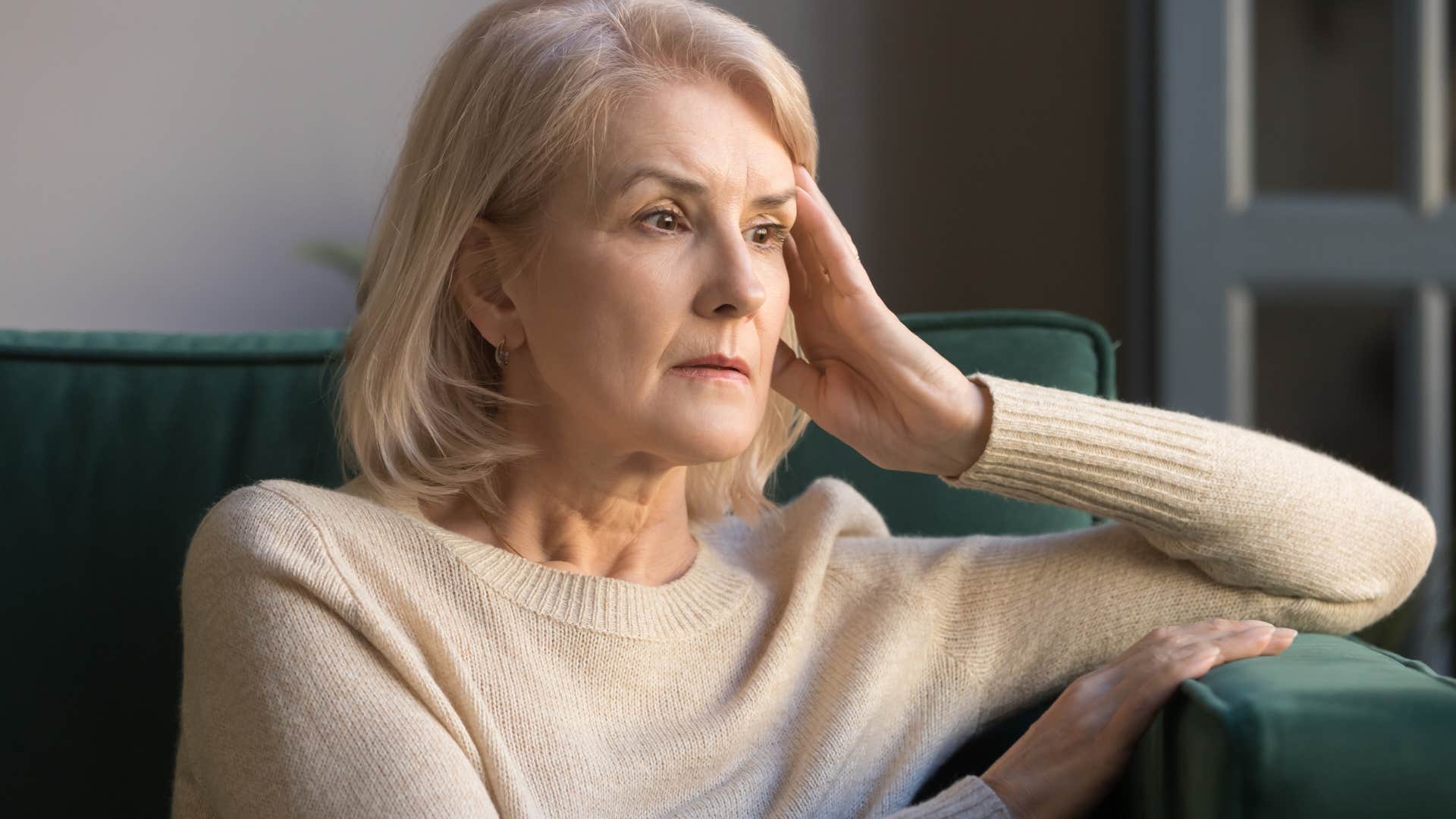 woman thinking about what her friends and family would say about her relationship