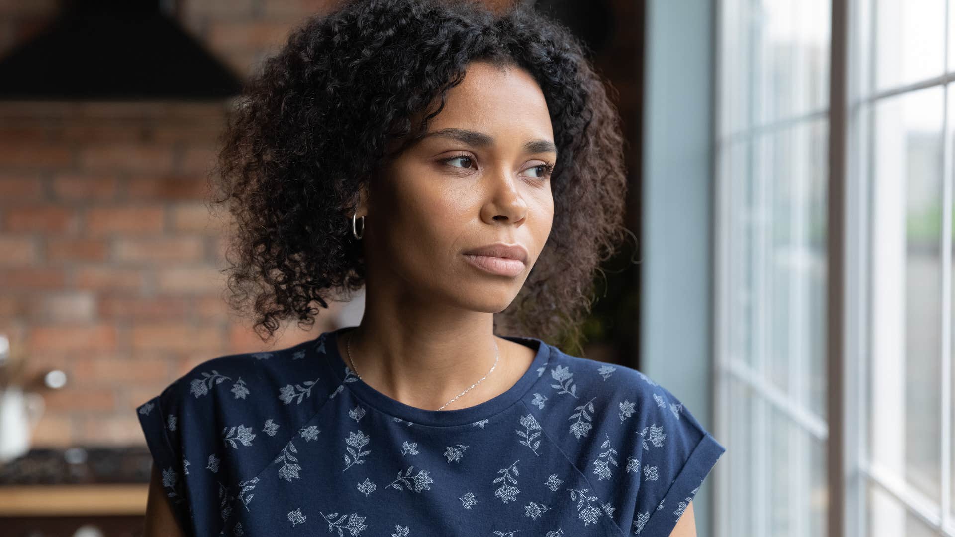 sad woman thinking about her missed connections