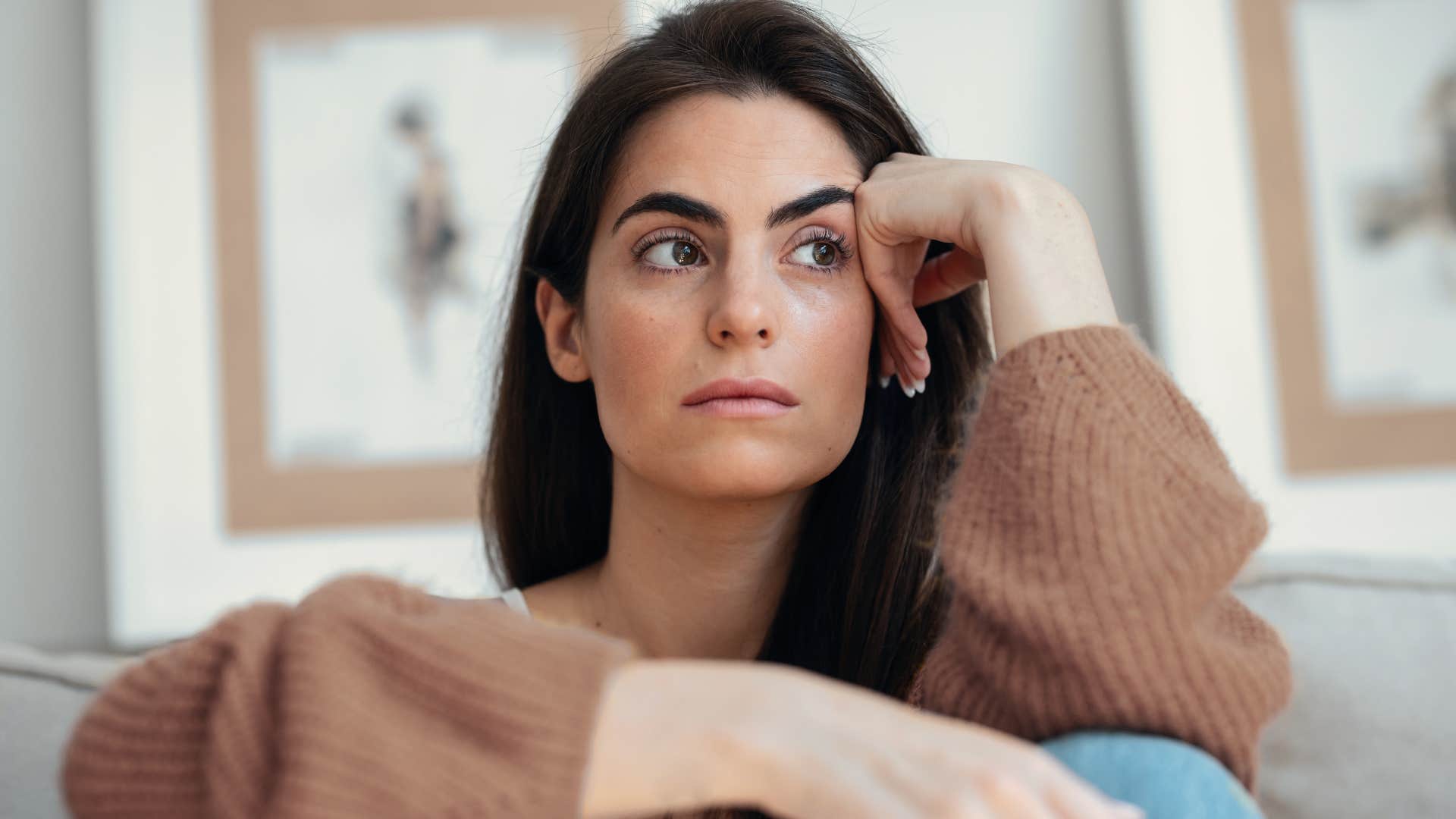 Woman tired of being the cool person sitting at home.