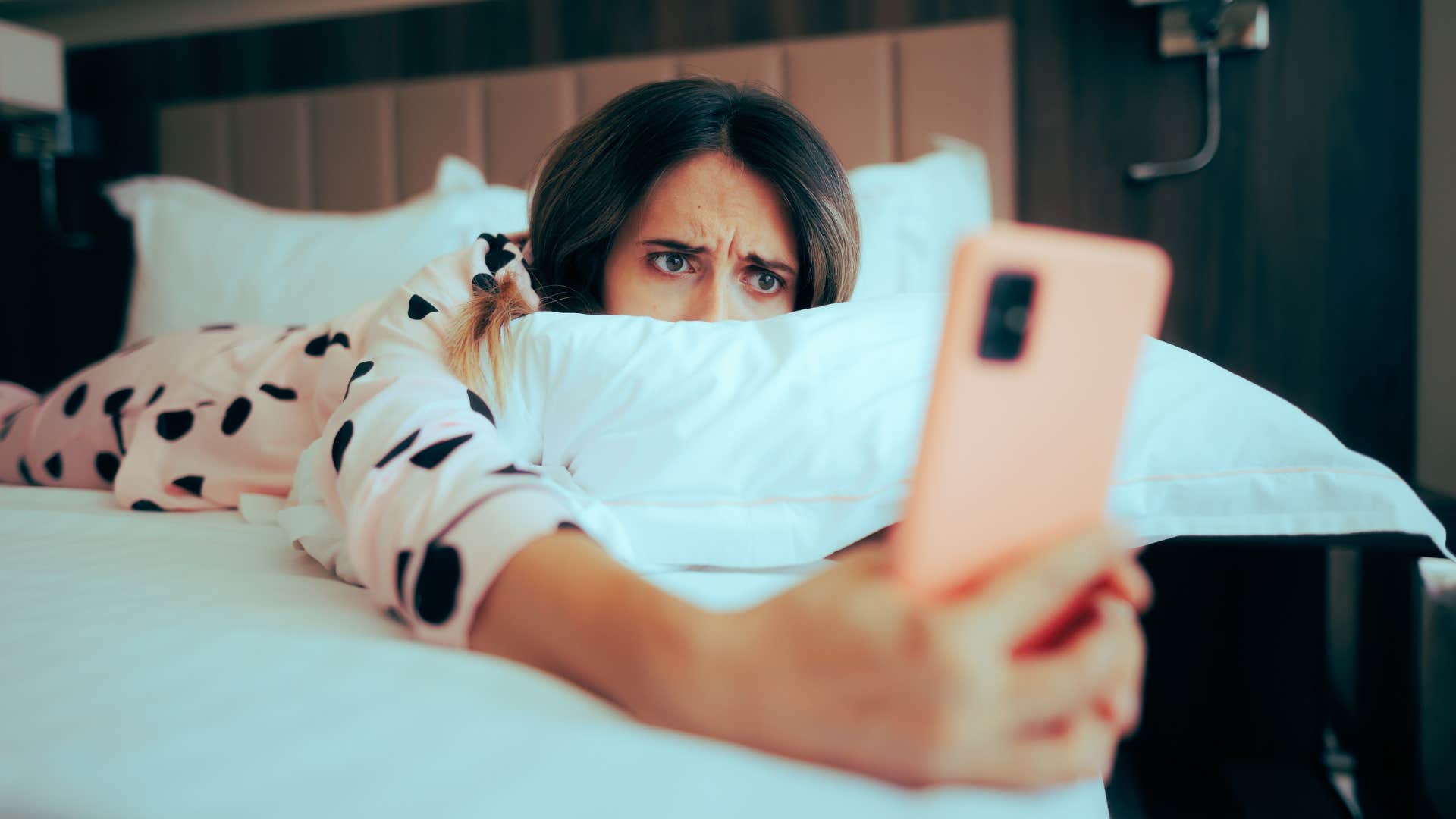 woman looking on social media at ex's profile