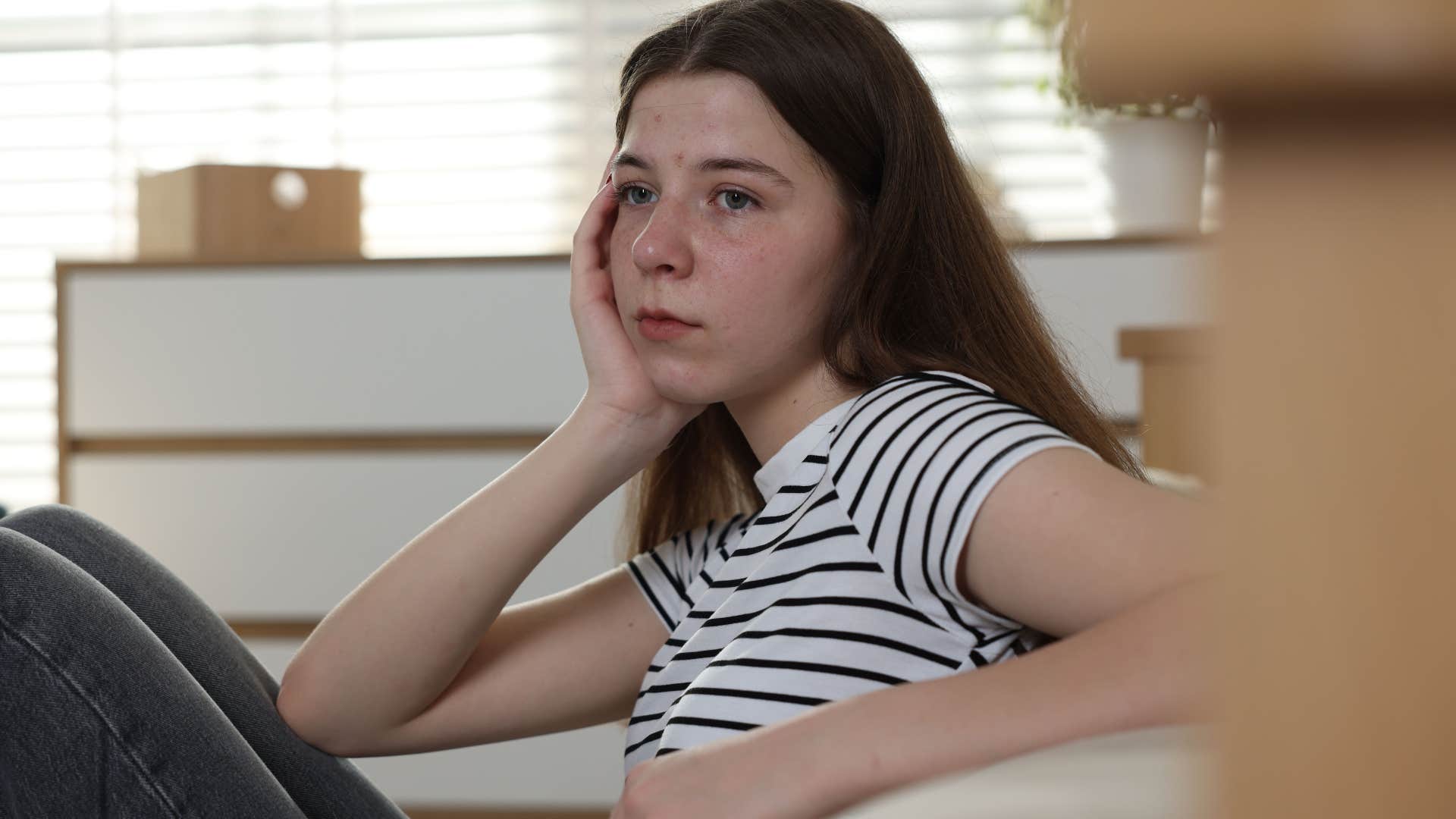 teenage girl who can't take accountability looking upset