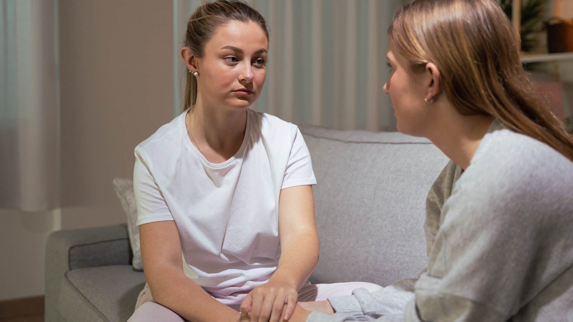 Woman who's never asking for help looking at her upset friend.