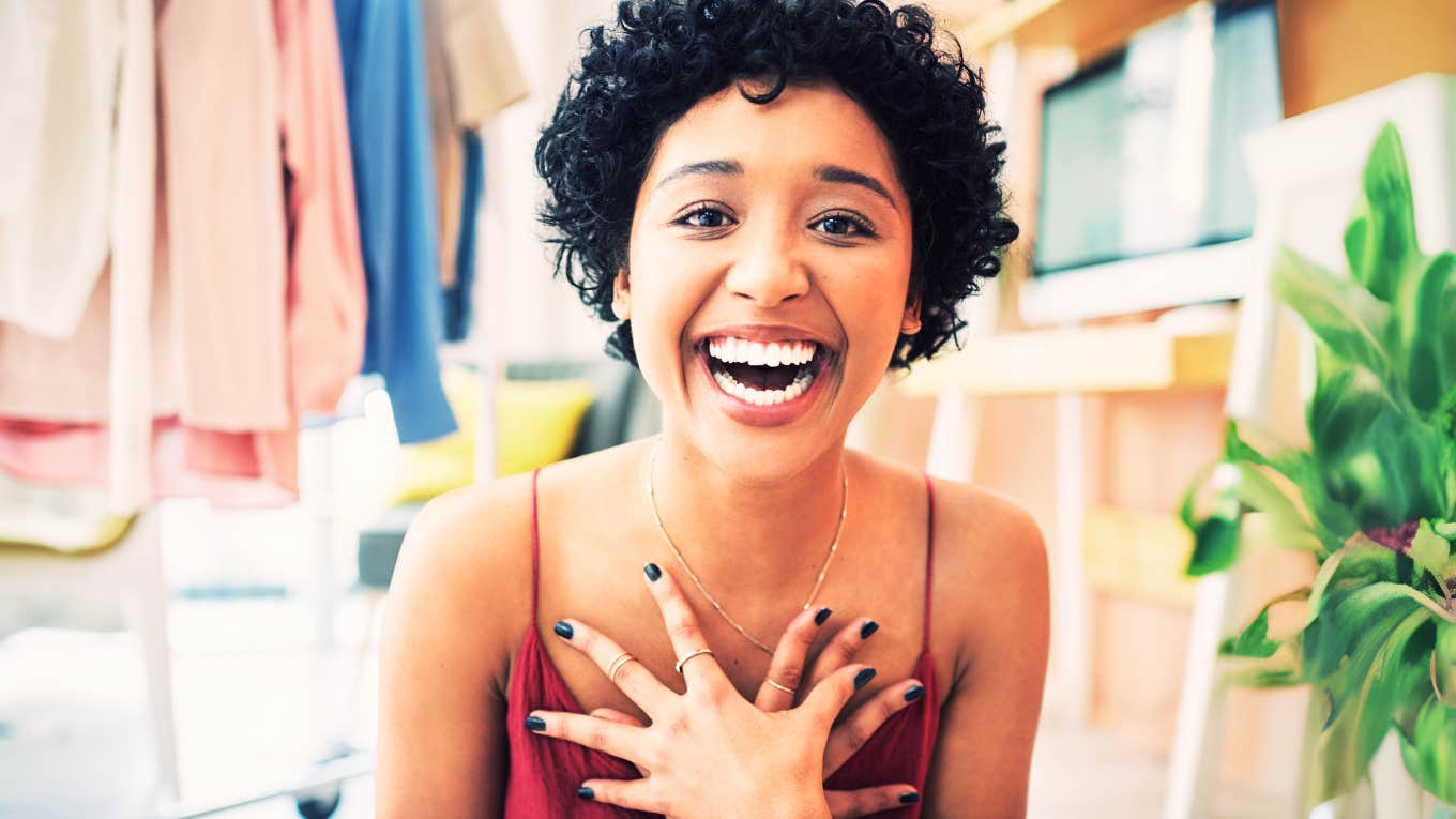 Experts Say These Tiny Daily Habits Set You Apart From Ninety-Eight Percent Of People Woman setting herself apart from others.