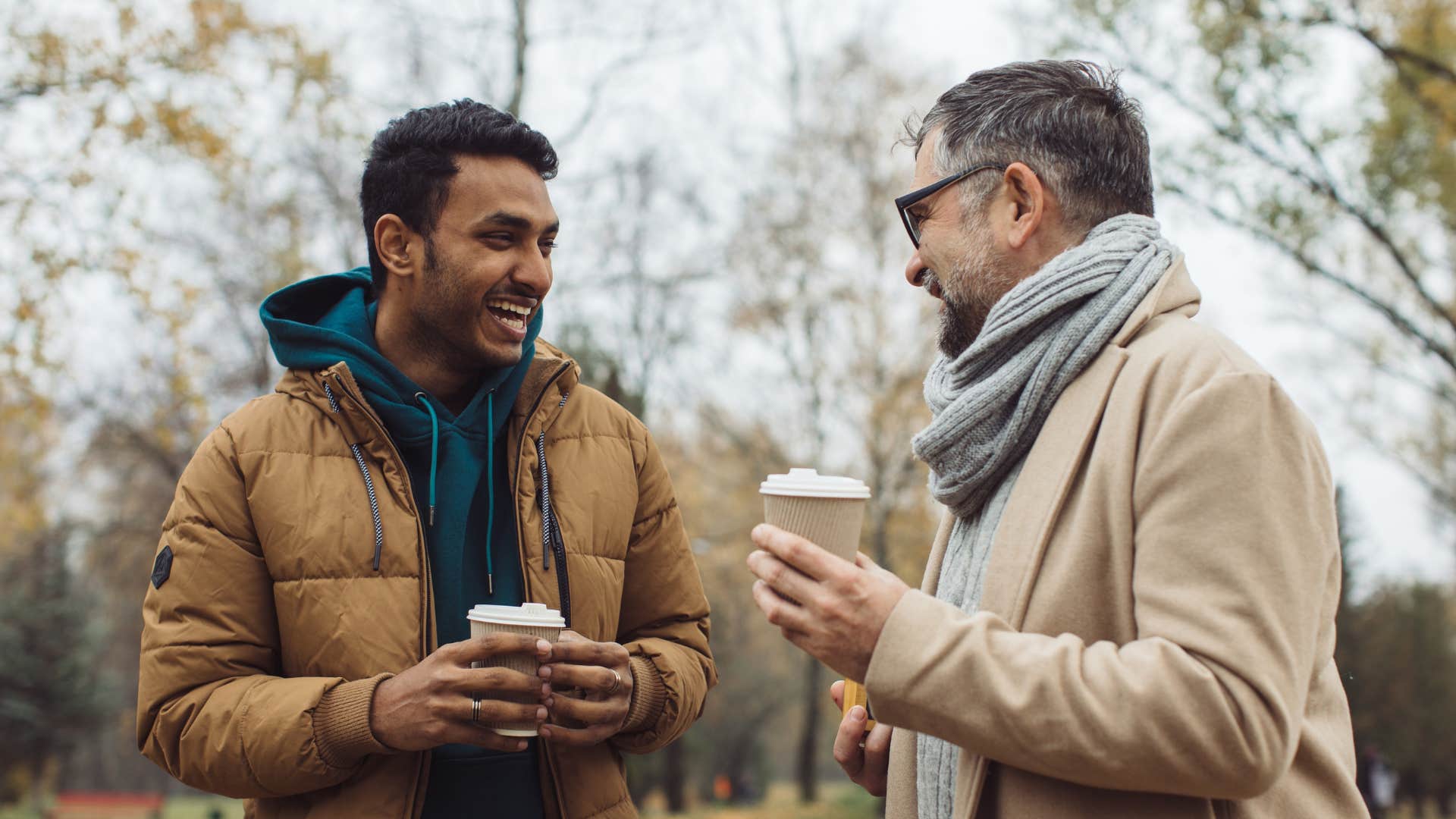 two male friends talking to each other despite foul odor