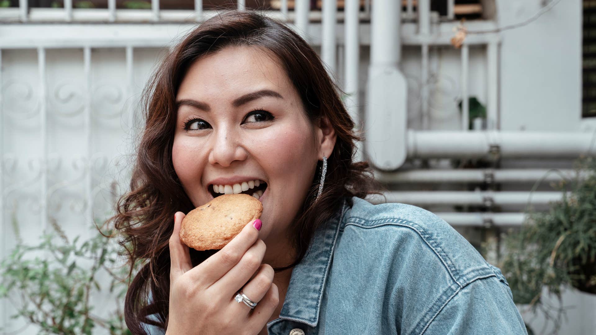 woman rewarding herself with a cookie