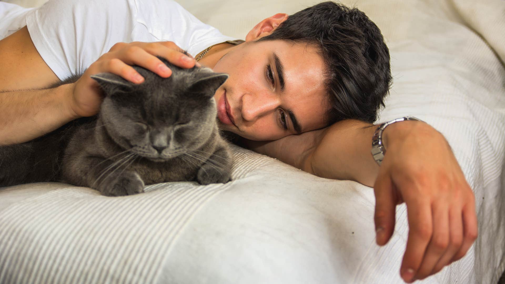 Person shares bed with pet for compassion