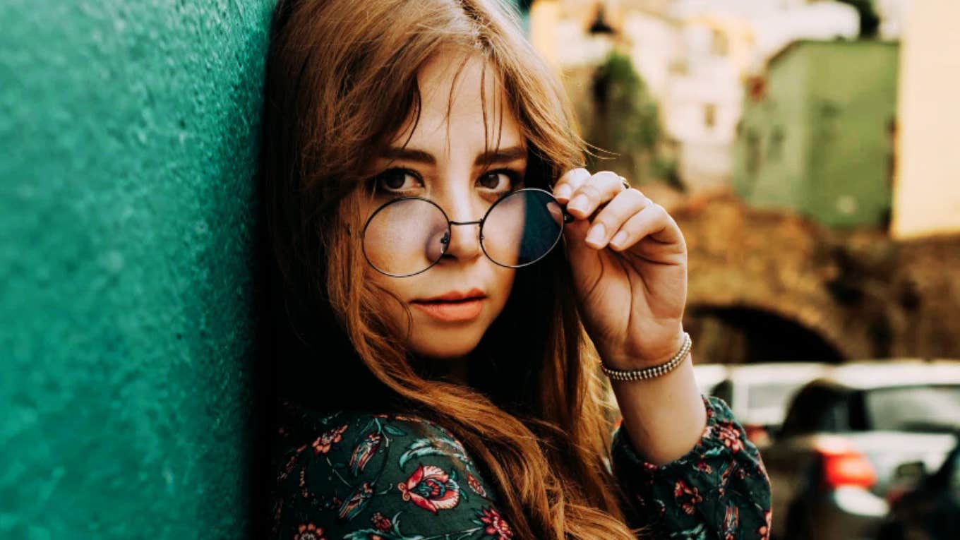 I Tried These Mindfulness Exercises And Finally Let Go Of The Emotional Weight I’d Been Carrying Woman letting go of emotional weight, trying mindfulness.