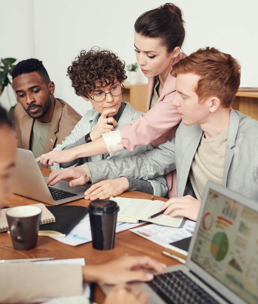 woman who is the connector at work working with colleagues