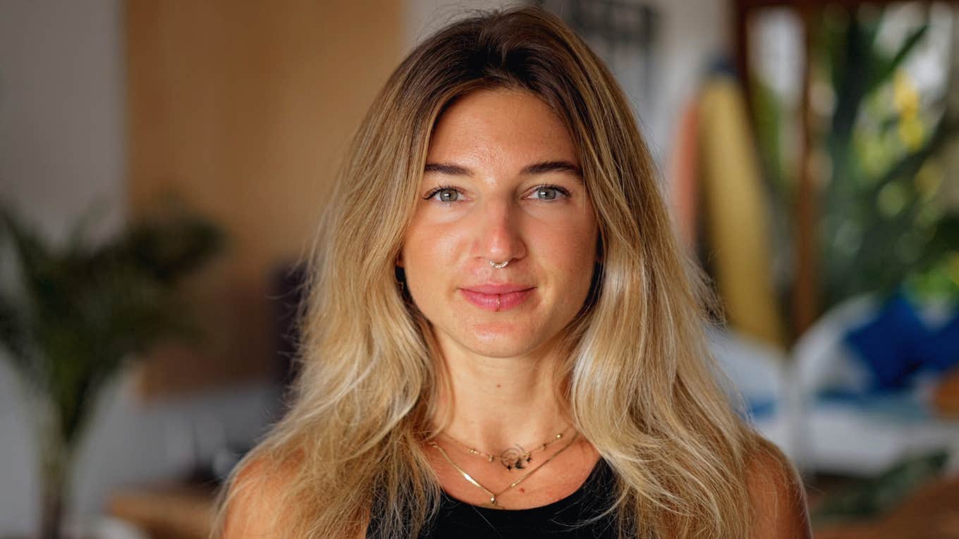 smiling woman realizing she's a good person deep down