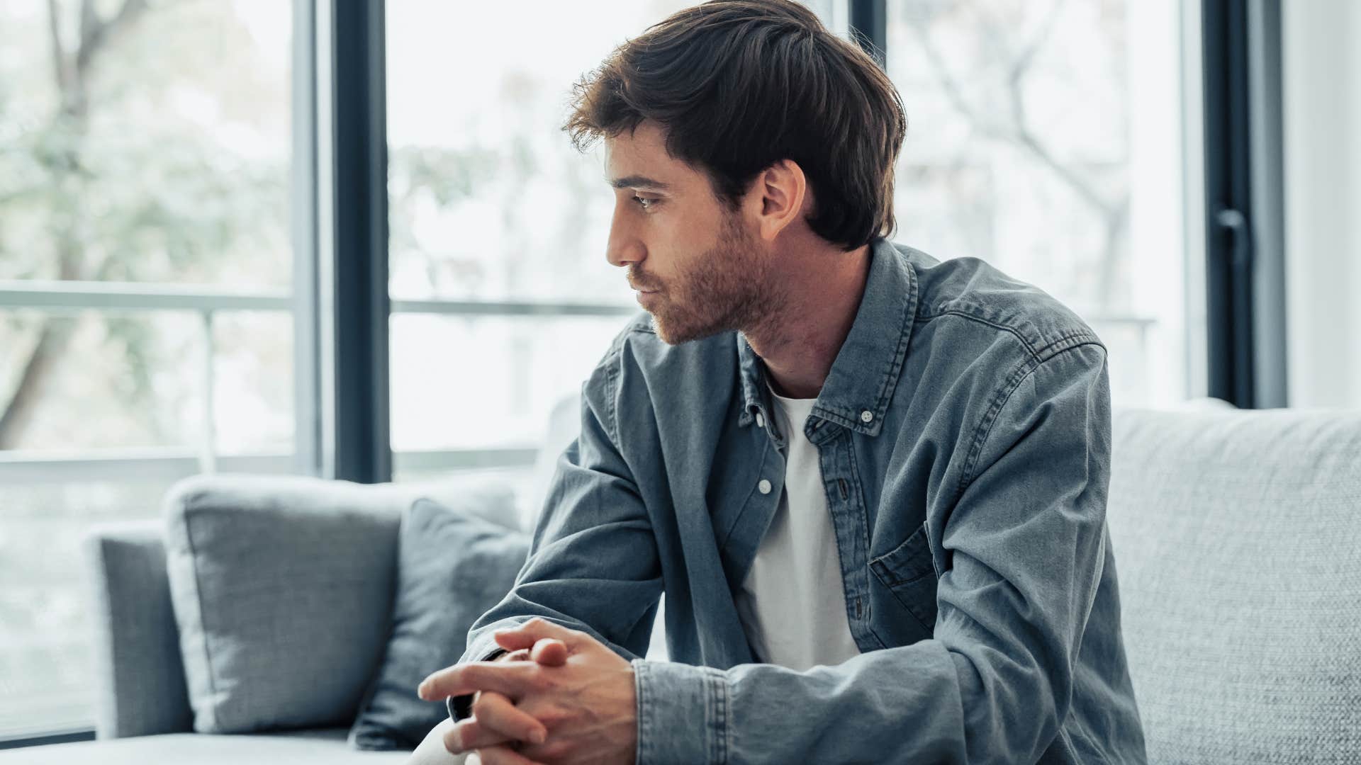 man feeling conflicted about drifting apart from people