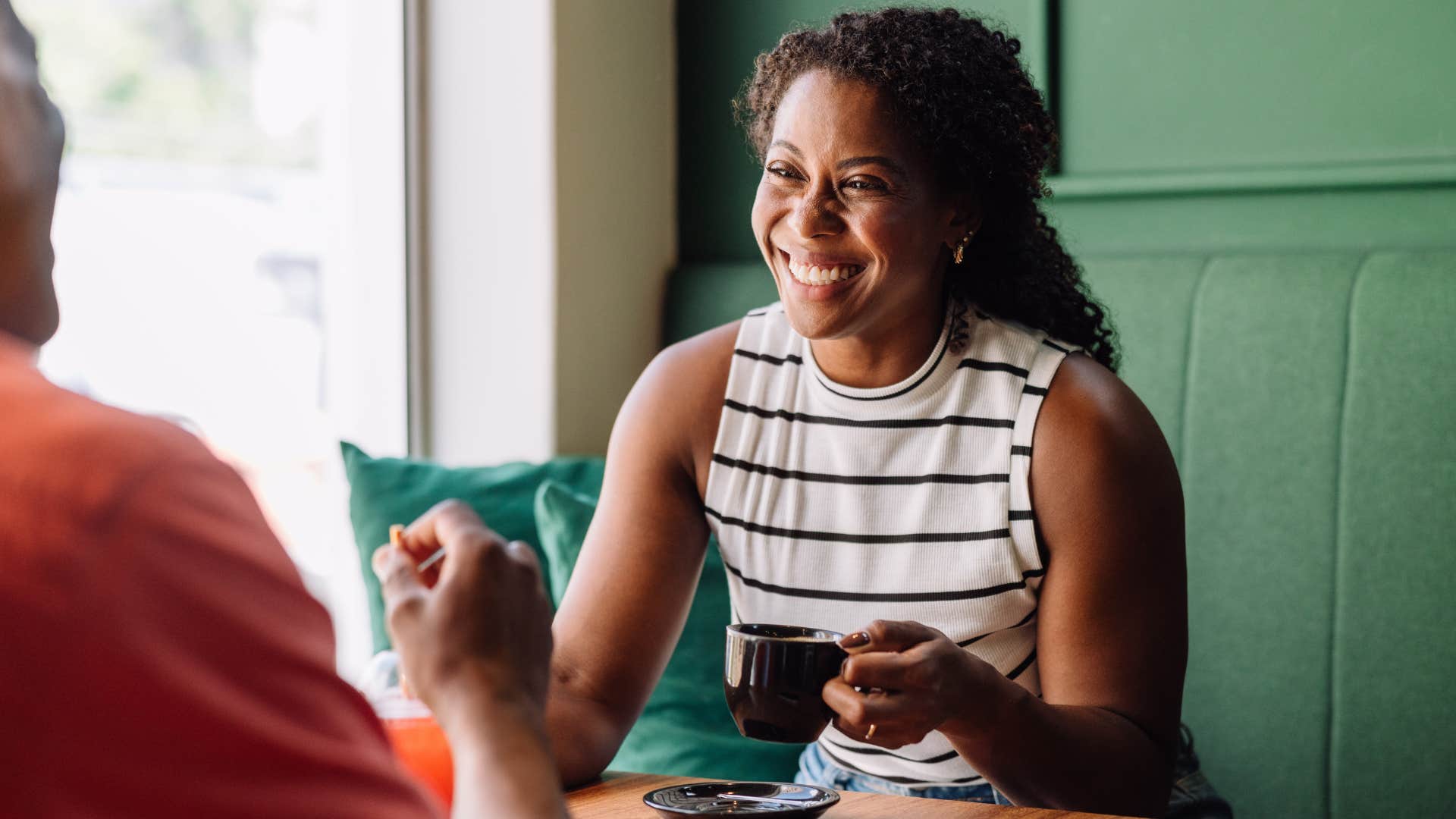 woman feeling awkward after being given praise