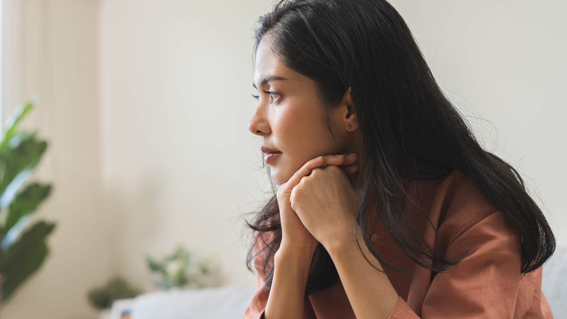 woman feeling sad that someone is left out