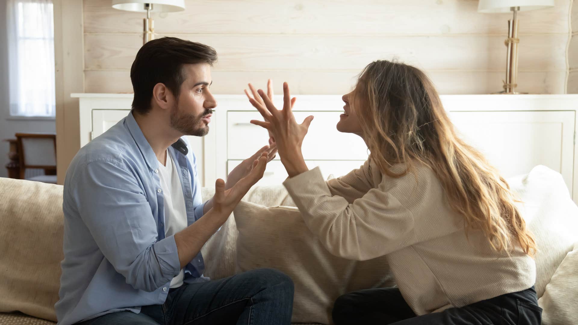 woman arguing with spouse and going to bed angry