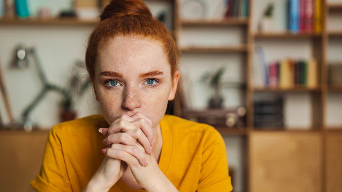 Ways To Know Someone Is Easy To Manipulate, According To Psychology stressed woman who is easy to manipulate