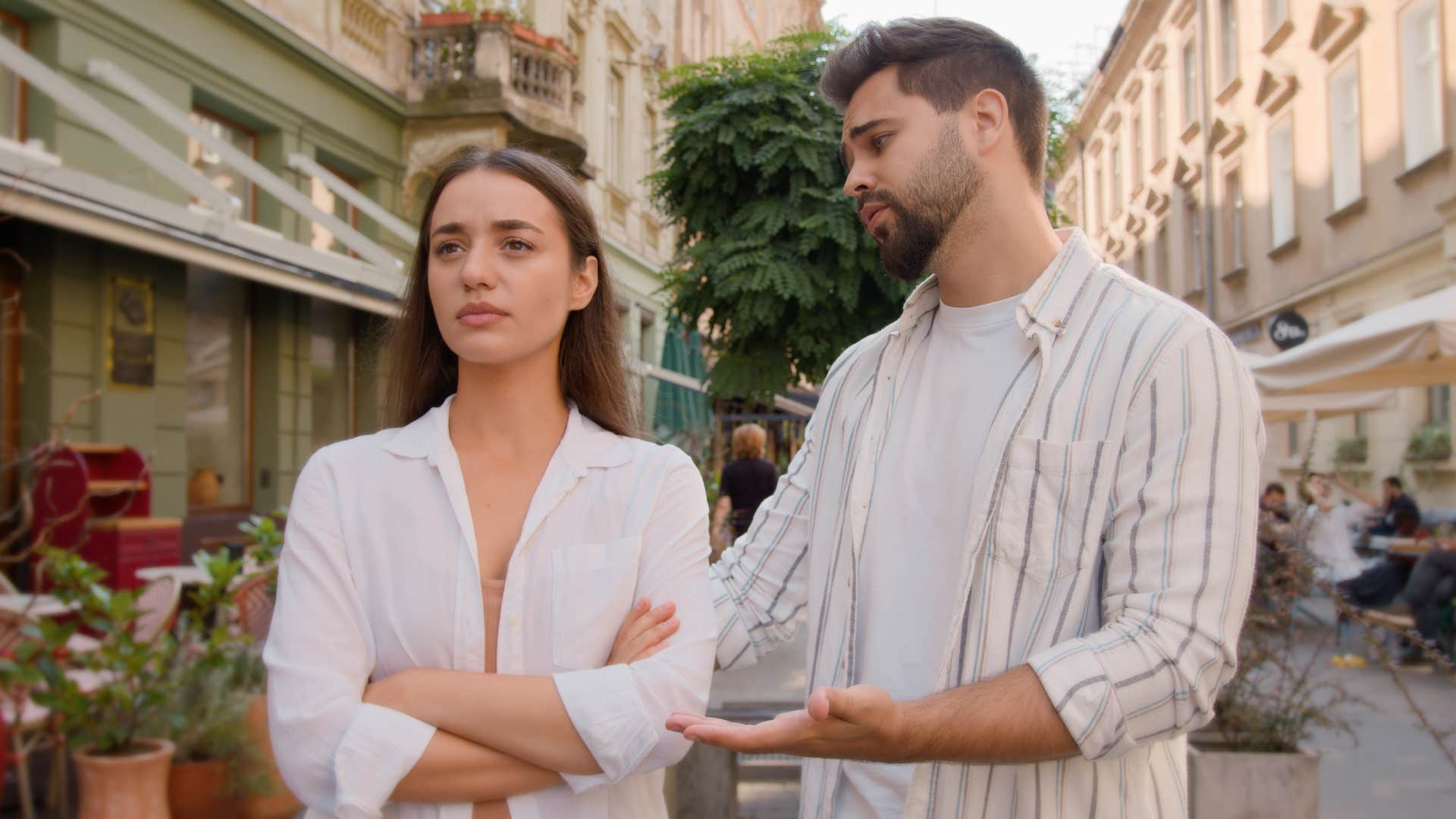 man apologizing frequently to woman