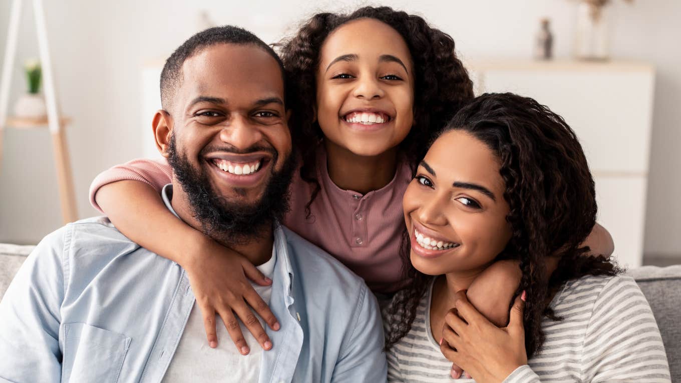 Ways Parents With No Disposable Income Still Made Childhood Feel Special For Their Kids happy couple with no disposable income making childhood special for their daughter