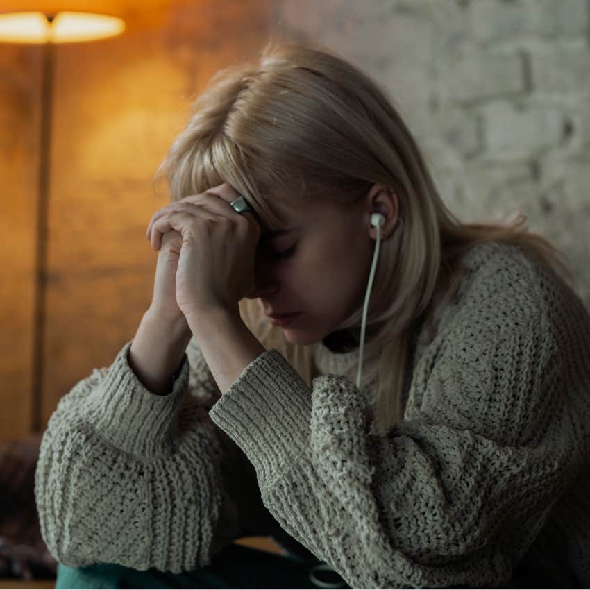 woman listening to music to snap out of a bad mood fast