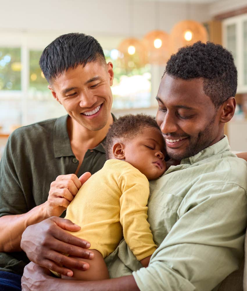 Two modern men don't struggle with baby