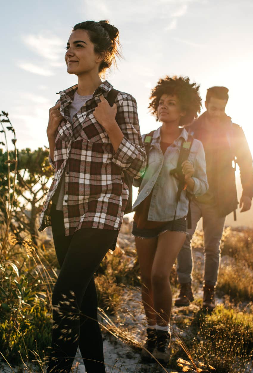 people walking in a rural area